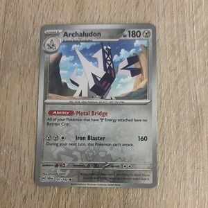 Archaludon Pokémon Card. Archaludon 107/142 Sv07: Stellar Crown Reverse Holo.